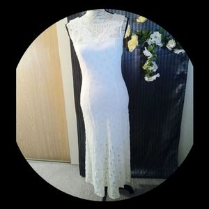 A lacey cream dress by monteau in large size.